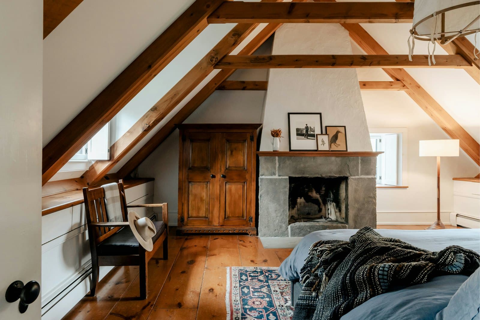 Attic bedroom with exposed wooden rafters